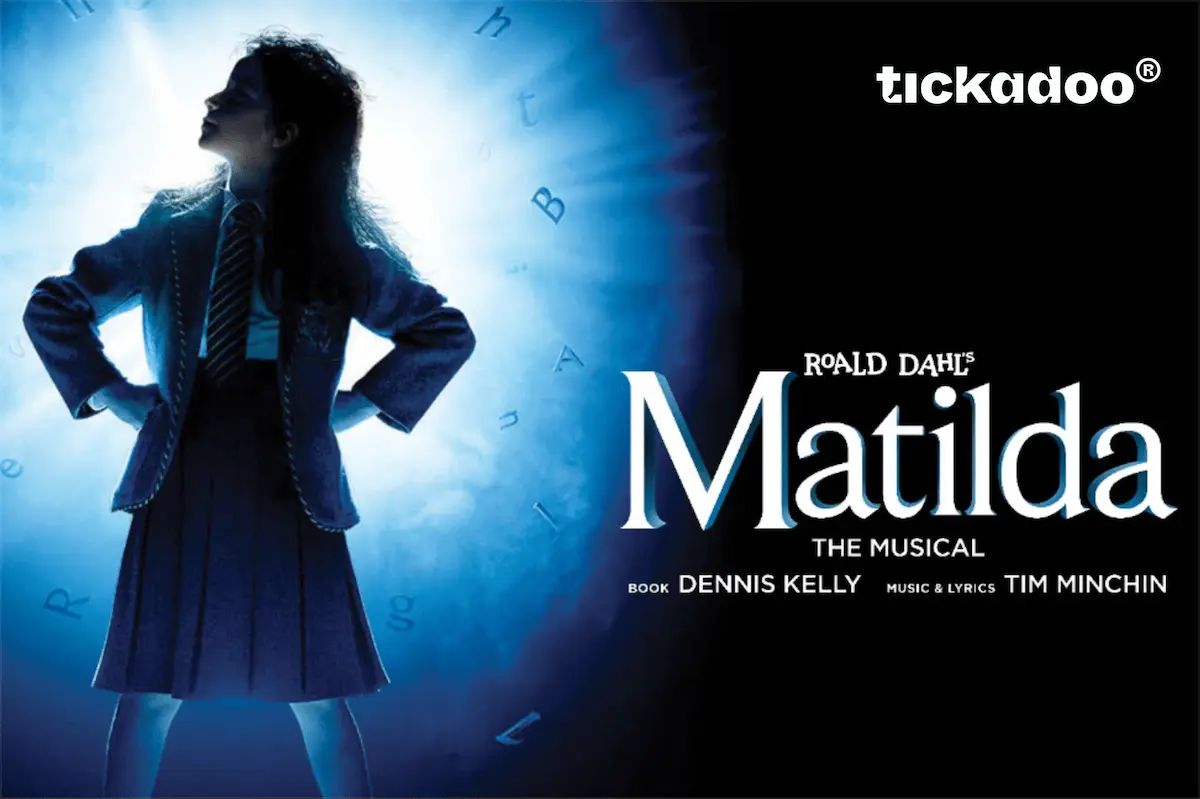 Giftcard featuring Matilda The Musical poster with a young girl in school uniform silhouetted against glowing blue background with floating letters, tickadoo logo in the top right corner.